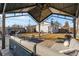 Inviting backyard with patio featuring comfortable seating under the shade of a backyard gazebo at 4389 S Sherman St, Englewood, CO 80113