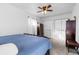 Serene bedroom featuring neutral tones, soft lighting, and ample closet space at 4389 S Sherman St, Englewood, CO 80113