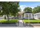 Charming home with a well-manicured front yard and welcoming entrance, featuring a mature shade tree at 4389 S Sherman St, Englewood, CO 80113