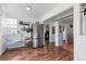 Kitchen with stainless steel refrigerator, wine cooler, and adjacent hallway at 4389 S Sherman St, Englewood, CO 80113