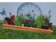 Rustic wagon wheel planter in backyard at 4389 S Sherman St, Englewood, CO 80113