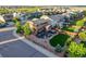 This aerial view showcases the home's backyard, patio, landscaping and surrounding neighborhood at 14384 Big Stone Dr, Parker, CO 80134