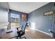 Stylish home office with hardwood floors, a large window, and a comfortable desk area, great for working from home at 14384 Big Stone Dr, Parker, CO 80134