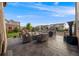Comfortable patio with outdoor furniture and multiple grills perfect for gatherings and relaxation at 14384 Big Stone Dr, Parker, CO 80134
