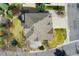 Aerial view of home featuring a neatly landscaped yard and a pristine gray roof at 5289 W Euclid Pl, Littleton, CO 80123