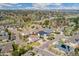 Overhead view highlighting the home's position within a tree-lined neighborhood at 5289 W Euclid Pl, Littleton, CO 80123