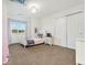 The bedroom is a tranquil retreat with a cozy bed and a window that fills the room with natural light at 5289 W Euclid Pl, Littleton, CO 80123