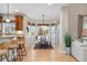 View of dining area with table setting and natural light from windows at 5289 W Euclid Pl, Littleton, CO 80123