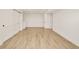 Spacious basement features modern flooring, laundry, and ample storage with a large closet at 621 S Harrison Ln, Denver, CO 80209