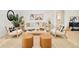 Comfortable living room featuring stylish seating, a neutral color palette, and a cozy rug at 621 S Harrison Ln, Denver, CO 80209
