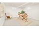 Bright home office with natural light, showcases a wooden desk and cozy chair creating a productive workspace at 621 S Harrison Ln, Denver, CO 80209