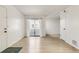 Bright and open living room featuring wood flooring and sliding glass doors to the patio at 1820 Newland Ct # 313, Lakewood, CO 80214