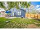Relaxing backyard with patio, grass area, and privacy fence at 12133 Crabapple St, Broomfield, CO 80020