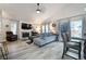 Bright living room featuring a fireplace, sectional sofa, and stylish decor at 12133 Crabapple St, Broomfield, CO 80020