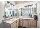 Main bathroom featuring dual sinks, large mirrors, and modern lighting fixtures at 12133 Crabapple St, Broomfield, CO 80020
