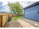 Landscaped side yard with fence and pathway at 12133 Crabapple St, Broomfield, CO 80020