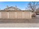 Exterior view of community garages at 3857 Mossy Rock Dr # 201, Highlands Ranch, CO 80126