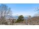 Scenic mountain view from the home featuring snow-capped peaks against a clear blue sky in a residential neighborhood at 3857 Mossy Rock Dr # 201, Highlands Ranch, CO 80126
