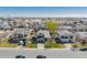 Suburban neighborhood aerial showcasing the home's location amidst well-spaced houses and greenery at 3788 Chavez St, Brighton, CO 80601