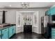 Kitchen area with stainless steel refrigerator and granite counters featuring a bright, sunny bay window at 3788 Chavez St, Brighton, CO 80601