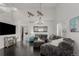 Spacious living room with high ceilings and dark floors, perfect for entertaining and relaxation at 3788 Chavez St, Brighton, CO 80601