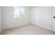 Clean and bright bedroom with a large window and closet for storage at 1205 W 101St Ave, Northglenn, CO 80260