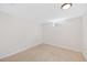 Empty bedroom featuring a small window and neutral carpet at 1205 W 101St Ave, Northglenn, CO 80260