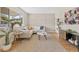 Comfortable living room with stylish decor, large windows, and ample space for relaxation at 1205 W 101St Ave, Northglenn, CO 80260