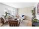 Bright living room with a large window, stylish furniture, and modern decor at 1205 W 101St Ave, Northglenn, CO 80260