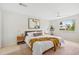 Serene bedroom featuring a comfortable bed, modern decor, and abundant natural light at 1205 W 101St Ave, Northglenn, CO 80260