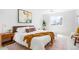 Inviting main bedroom featuring a large window, neutral colors, and comfortable furnishings at 1205 W 101St Ave, Northglenn, CO 80260