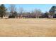 Expansive community space featuring a grassy area and amenities at 1255 S Wheeling Way, Aurora, CO 80012