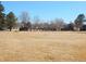 Community space offers a large grassy area and mature trees at 1255 S Wheeling Way, Aurora, CO 80012