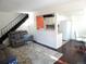 Spacious living room open to the kitchen, offering a versatile living space at 1255 S Wheeling Way, Aurora, CO 80012
