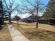 Charming neighborhood street view showcases well-maintained homes and neat landscaping at 1255 S Wheeling Way, Aurora, CO 80012