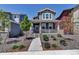 Charming home with covered porch and stylish landscaping at 8049 Monte Vista Cir, Littleton, CO 80125