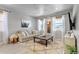 Relaxing living room filled with natural light, a comfy sofa, and minimalist decor at 8049 Monte Vista Cir, Littleton, CO 80125