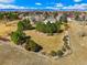 Expansive aerial view of a beautiful property with mountain views and lush landscaping in a serene neighborhood setting at 2174 Meadow Vale Rd, Longmont, CO 80504
