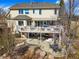 Spacious backyard featuring a multi-level deck, patio, and landscaped garden area at 2174 Meadow Vale Rd, Longmont, CO 80504