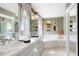 A large bathroom with a double vanity and a separate bathtub at 2174 Meadow Vale Rd, Longmont, CO 80504