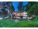 Back of house with deck and yard is perfect for outdoor living at 3201 Country Club Pkwy, Castle Rock, CO 80108