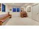 A finished basement features carpeting, natural light, and an antique desk at 3201 Country Club Pkwy, Castle Rock, CO 80108