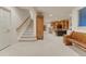 A spacious basement with carpeting, natural light, and built in storage solutions offers many possibilities at 3201 Country Club Pkwy, Castle Rock, CO 80108