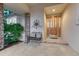 Covered front porch featuring comfortable seating and decorative brickwork at 3201 Country Club Pkwy, Castle Rock, CO 80108
