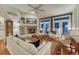 Cozy living room features a fireplace, vaulted ceilings, and natural light at 3201 Country Club Pkwy, Castle Rock, CO 80108