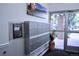 An interior view of a condo lobby with mailboxes and an outside view at 650 S Clinton St # 2A, Denver, CO 80247