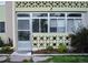 Enclosed sunroom with privacy, featuring plants and seating at 650 S Clinton St # 2A, Denver, CO 80247