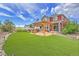 Beautiful backyard with a pergola and grill, perfect for outdoor entertaining and relaxing at 21900 E 46Th Pl, Aurora, CO 80019