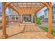 Spacious backyard featuring a pergola, a built-in grill, and a comfortable patio area at 21900 E 46Th Pl, Aurora, CO 80019