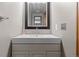 Corner bathroom sink with cabinet at 7767 Elmwood St, Littleton, CO 80125